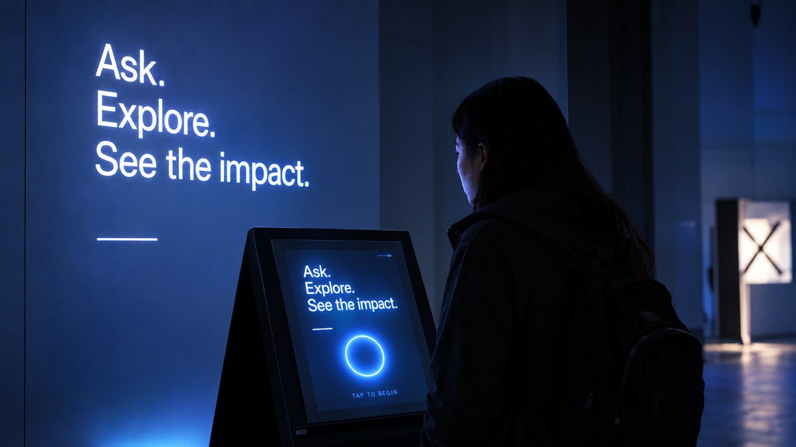 Illustration of a visitor at a lit kiosk reading “Ask. Explore. See the impact.” with a tap-to-begin prompt.